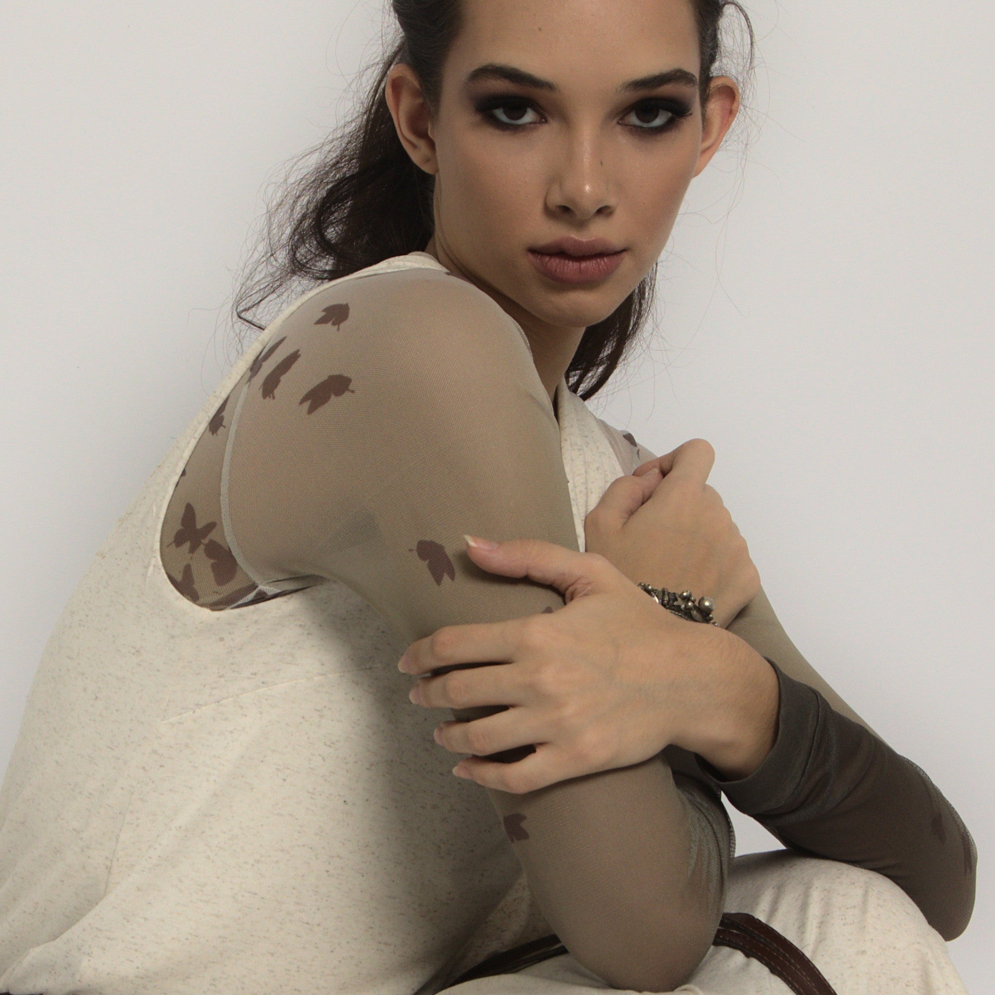 Olivia - Blusa transpassada sem mangas