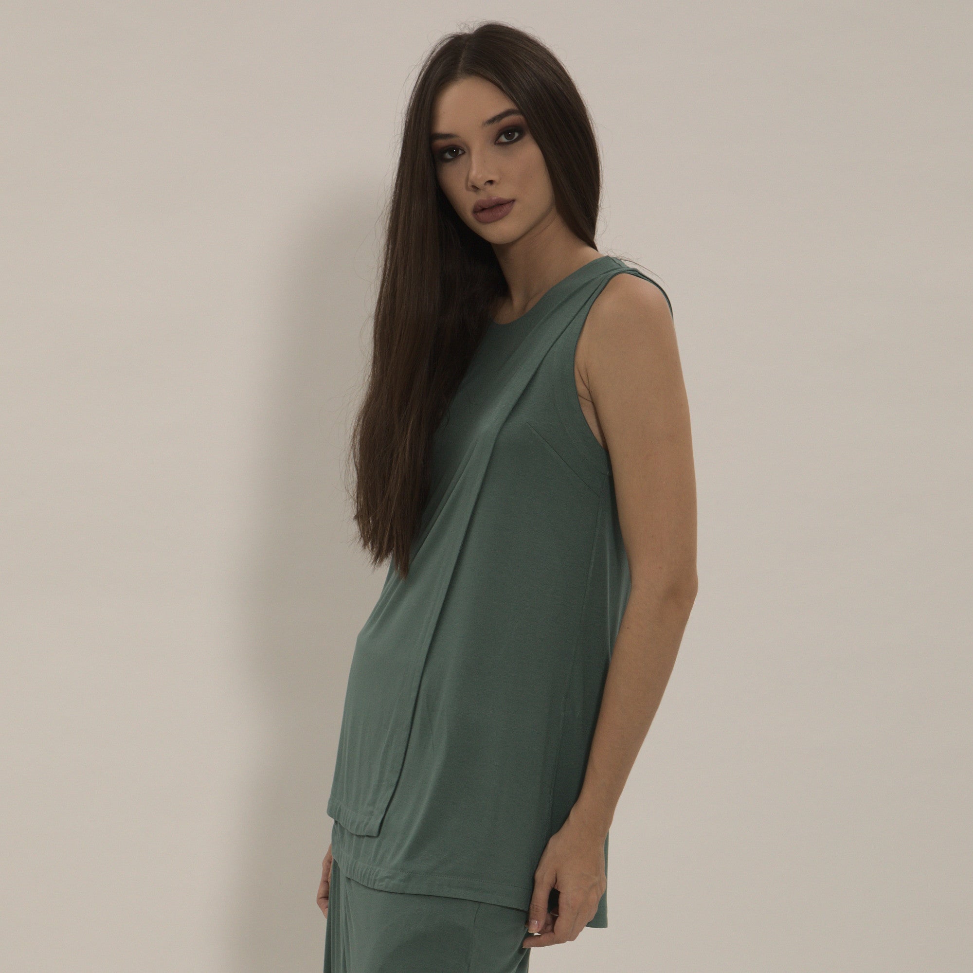 Olivia - Blusa transpassada sem mangas